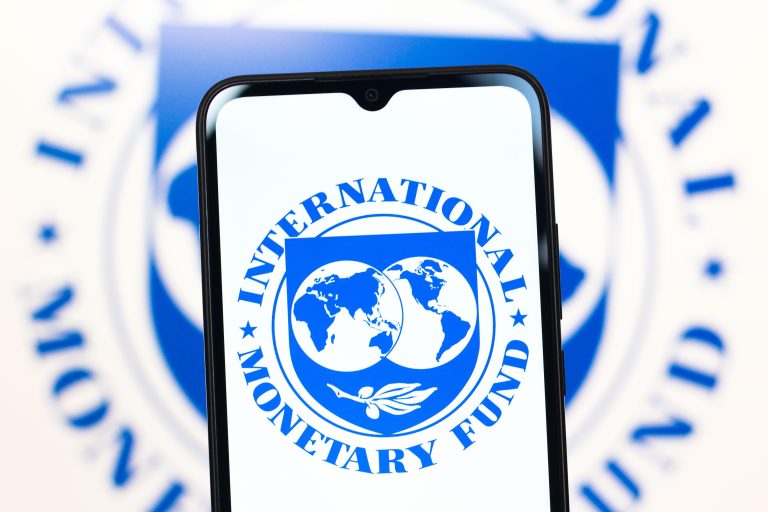 In this photo illustration, the International Monetary Fund (IMF) logo is seen displayed on a smartphone screen