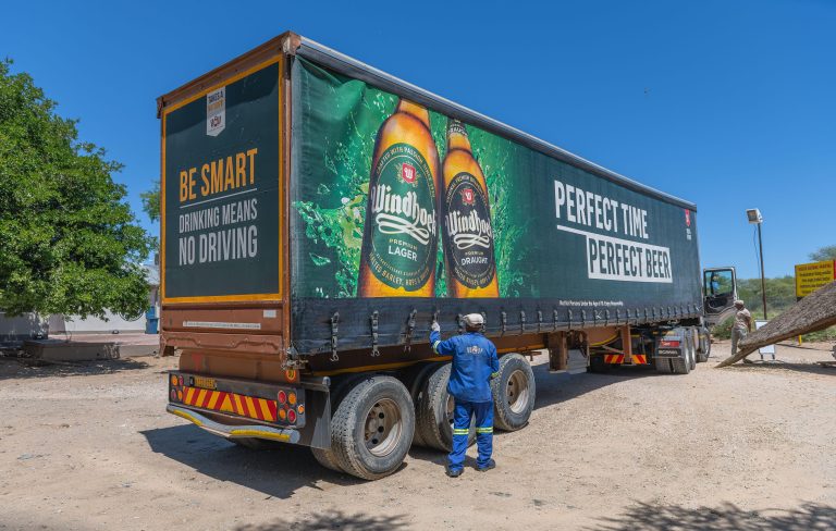 Large beer truck in a parking lot near Otjiwarongo, Namibia